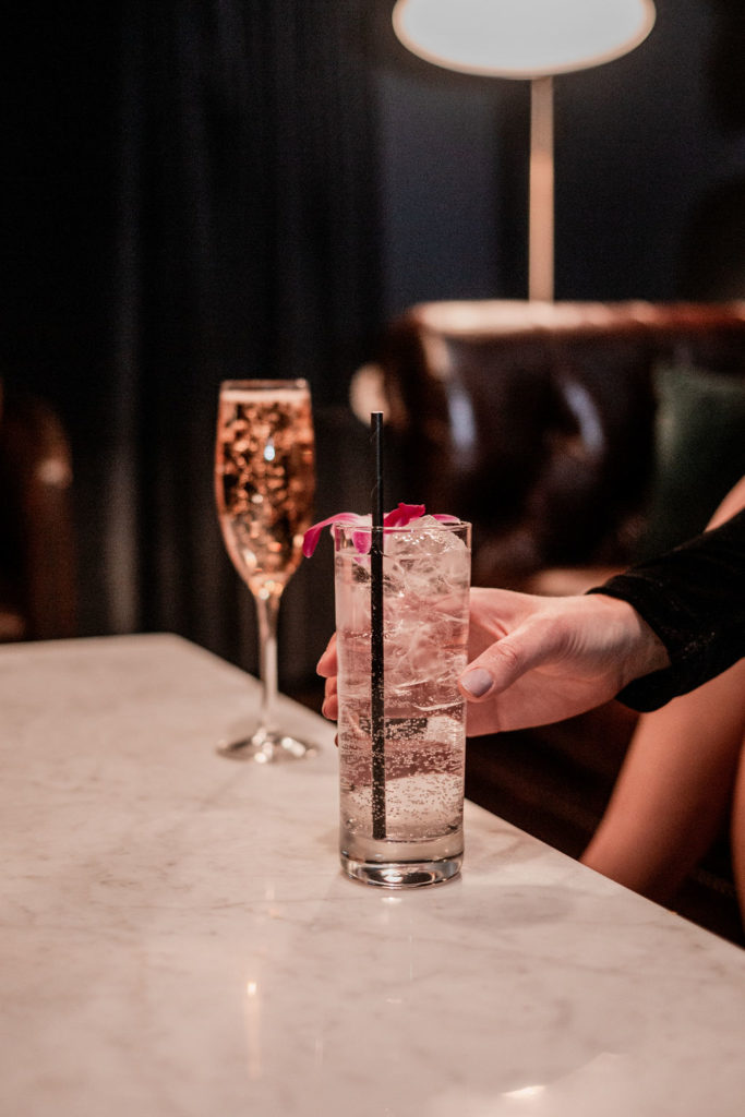 Girl Reaching For Cocktail @ Ace Gillett's